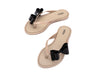 Melissa Flip Flop in beige with a cute flat bow design, stylish and comfortable slip-on footwear for women.