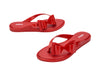 Melissa Flip Flop in red with a cute flat bow design, stylish and comfortable slip-on footwear for women.