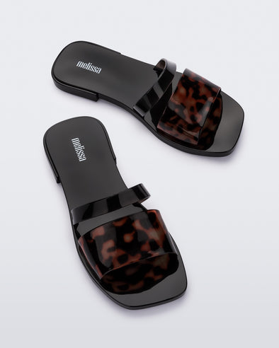 Melissa Ivy II AD Black Flat Slide for Women – Stylish, comfortable, and versatile flat slides perfect for casual wear, summer outings, and everyday occasions.