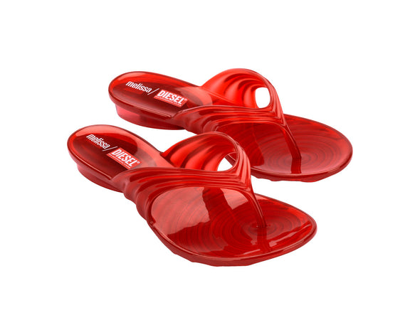 Melissa Quantum Thong Diesel trendy red flip flops for women featuring a stylish design and comfortable everyday wear.