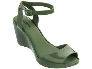 Melissa Blanca Ankle Strap Peep Toe Wedges Heel Green Sandal for Women – Trendy and comfortable wedge sandals featuring a peep-toe design and adjustable ankle strap, perfect for casual and dressy looks.

