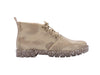 Melissa Fluffy Lace-Up Husk Boot worn with casual attire, offering a trendy and cozy look for both men and women.