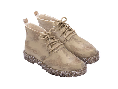 Melissa Fluffy Lace-Up Husk Boot worn with casual attire, offering a trendy and cozy look for both men and women.