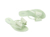 Melissa Harmonic Sweet IV light green flat flipflops with bow for women – stylish and comfortable summer footwear