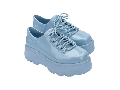 Melissa Kick Off AD Blue Heel Sneakers for Women – Trendy and comfortable blue sneakers with an elevated heel, perfect for casual wear, street style, and sporty outfits.