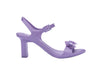 Melissa Lady Emme Blossom Viktor & Rolf Floral Lilac Heel Sandal for Women – Elegant high-heeled sandal with floral embellishments, offering a stylish and feminine touch for special occasions.