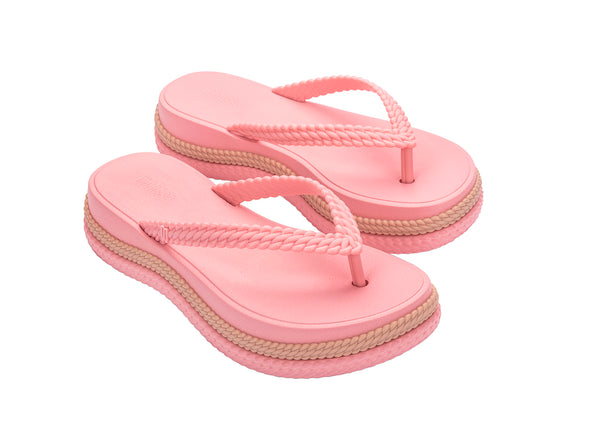 Melissa Leblon pink platform flip-flops for women, stylish and comfortable footwear for casual outings and vacations. Stylish flip flop slippers