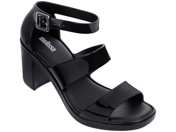 Melissa Model Block Heel Strappy Black Sandal styled for versatile summer outfits, combining comfort and sophisticated style.