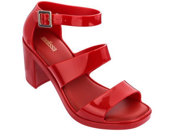 Melissa Model Block Heel Strappy Red Sandal, focusing on the soft straps and block heel.