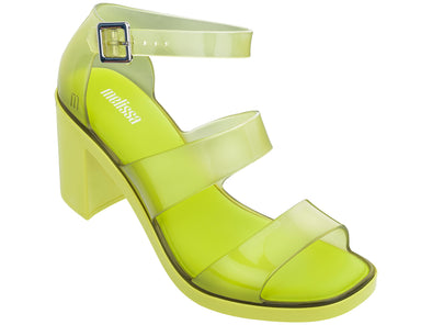 Melissa Model Block Heel Strappy Yellow Sandal, focusing on the flexible Mel-Flex material and block heel.