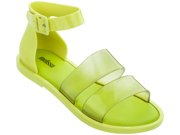 Melissa Model Flat Strappy Yellow Sandal styled for casual summer fashion, combining comfort and style.