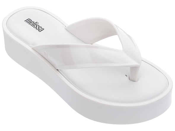 Melissa Platform Heel Slip-On Flip Flop Slippers White for Women – Stylish and comfortable white platform flip-flops with a slip-on design, perfect for casual outings, beach days, and summer wear.