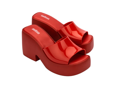 Melissa Posh AD Red Platform Heel Slide for Women – Stylish and comfortable slip-on sandals with a bold red platform heel, perfect for any occasion.