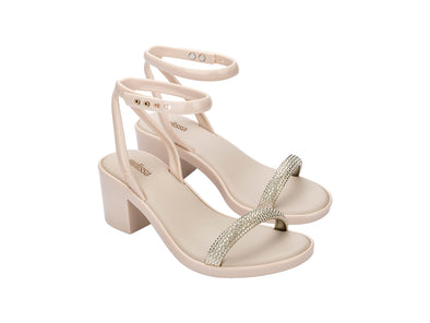 Melissa Shiny Block Heel Strappy Beige Sandal for Women – Stylish beige block heel sandals with elegant straps, perfect for party and casual wear.