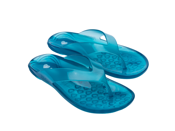 Melissa The Real Jelly Clear Blue Flip Flop Unisex Slippers – Trendy and comfortable jelly slippers with a transparent blue design, perfect for casual wear.