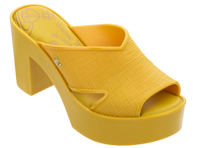 Melissa VWA Yellow Mule II Block Heel Slide for Women – Trendy and stylish yellow block heel mules with a slip-on design, perfect for casual and dressy occasions.