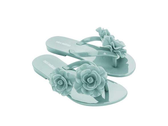 Buy Mini Melissa Harmonic Garden green floral flipflop sandal for girls. Stylish, lightweight, and comfortable footwear perfect for summer, daily wear, and parties.