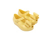 Mini Melissa Ultragirl Sweet VII Oversize Bow Yellow Baby Sandal – Adorable yellow baby sandals with a large bow design, comfortable fit, and charming style for little girls.